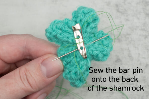 sew-bar-pin-onto-crochet-shamrock